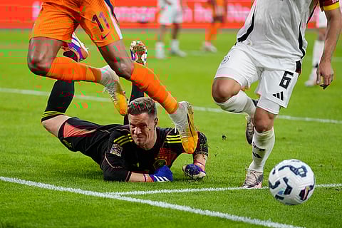 UEFA Nations League, Netherlands vs Germany: Germany's goalkeeper Marc-Andre ter Stegen saves before Netherlands' Cody Gakpo can score